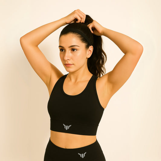 Women's Black Sports Bra – Front View Worn by Model for Gymwear Showcase