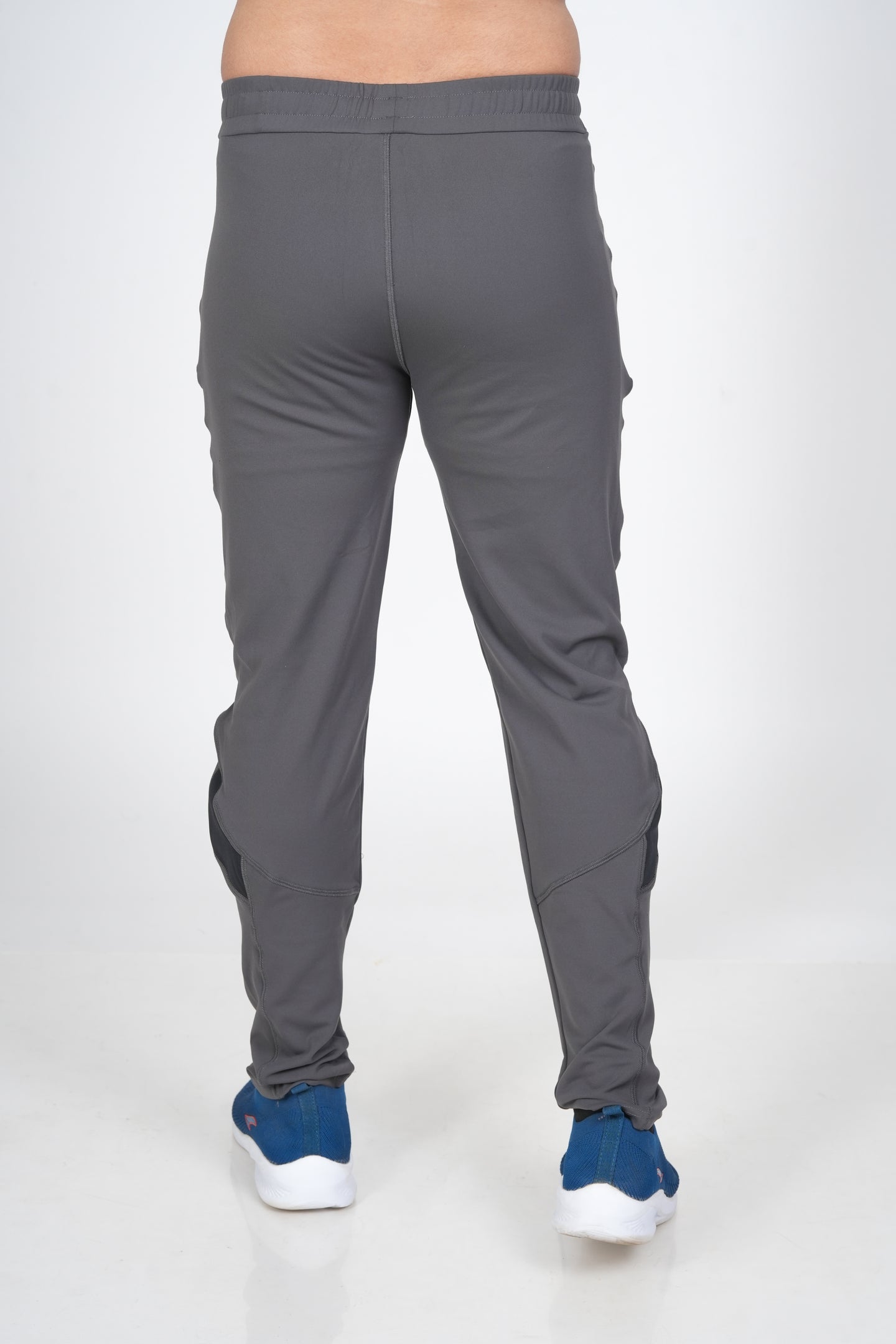 Men's Grey Track Pant – Back View Displaying Tapered Fit and Minimal Stitching