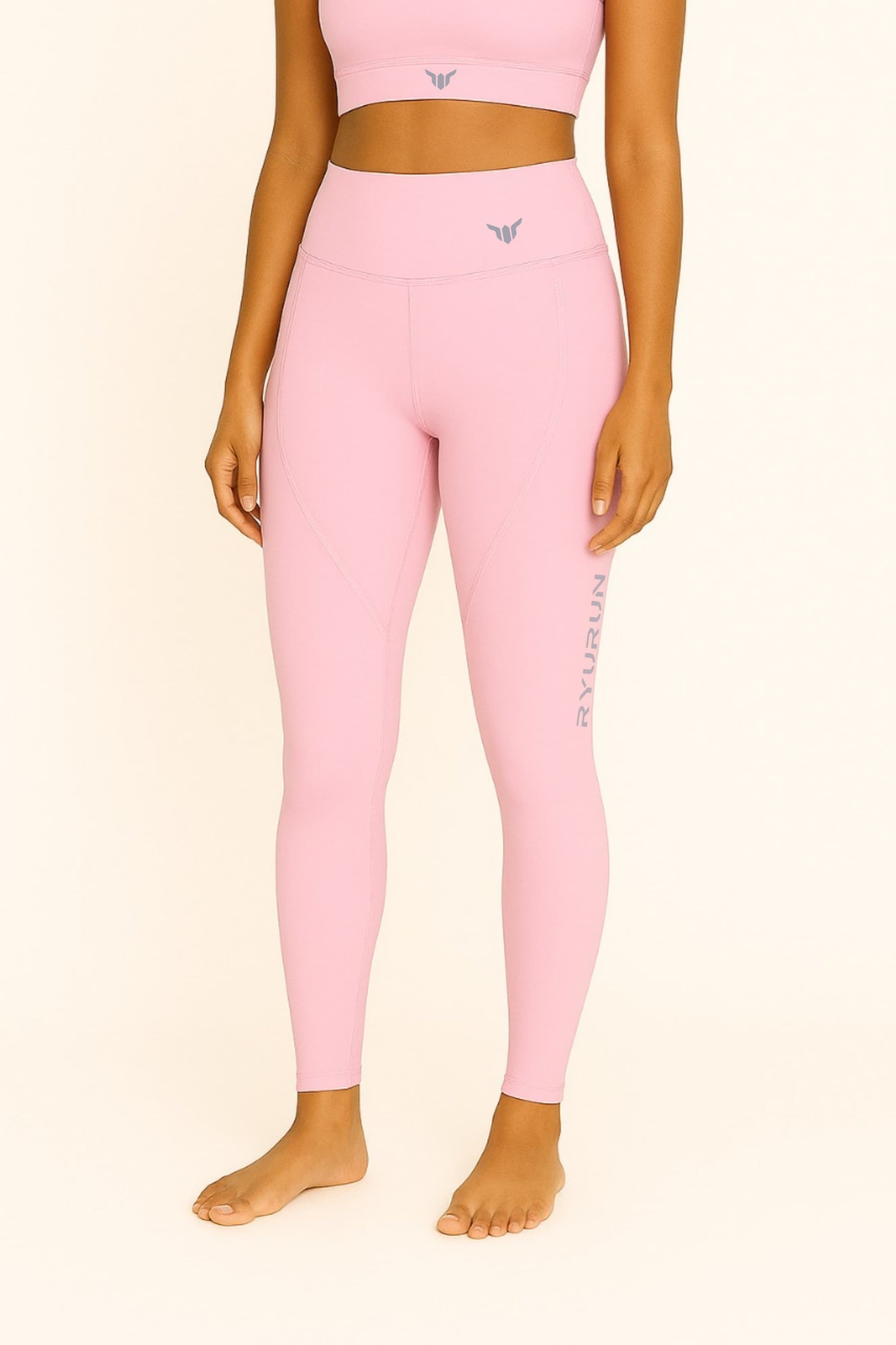 Women's Baby Pink Leggings – Front View with Model Highlighting High Waist, Core Support, and Clean Fit