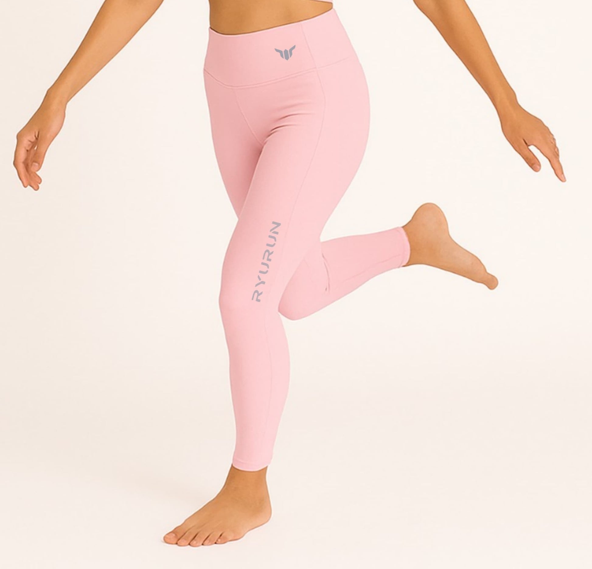 Women's Baby Pink Leggings – Left Side View Displaying Stretch Fabric, Hip Curve, and Ankle Length