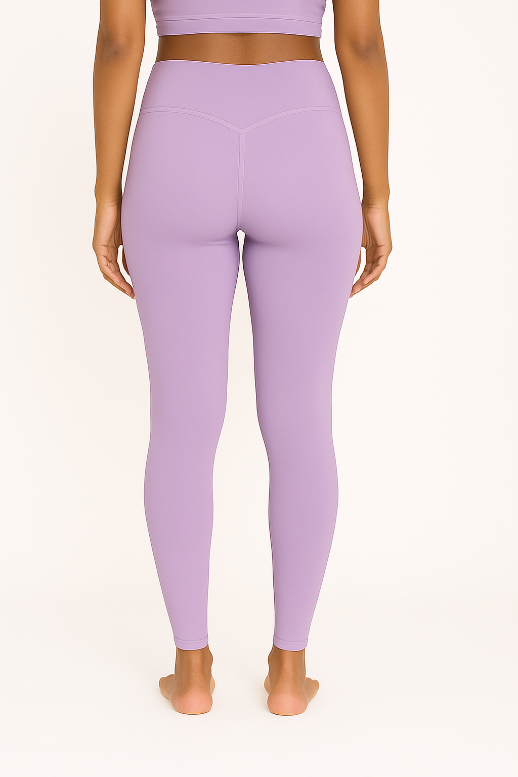 Women's Lavender Leggings – Back View with Model Showcasing Rear Fit and Tapered Design