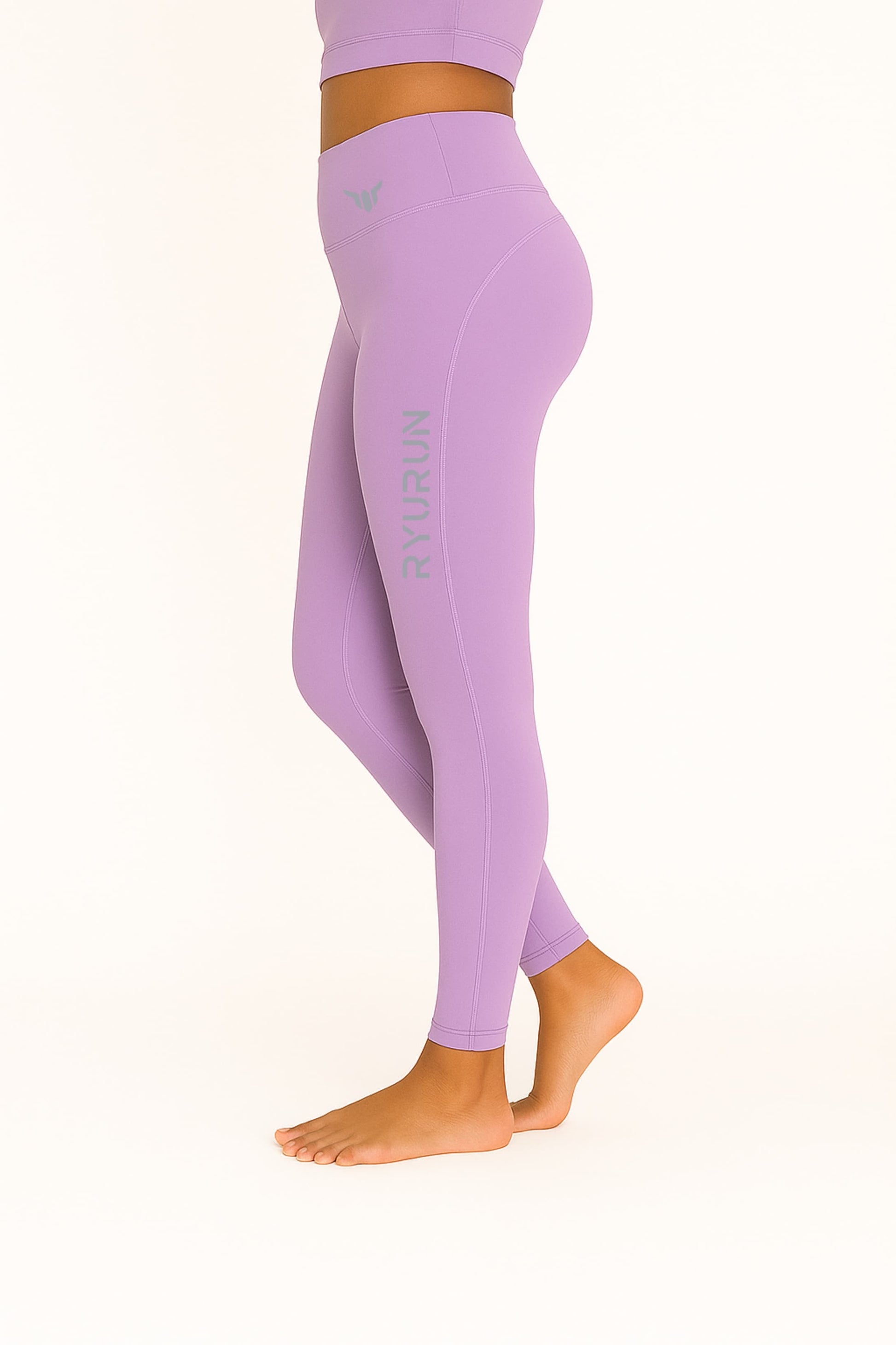 Women's Lavender Leggings – Left Side View Displaying Hip Curve, Length, and Fabric Stretch