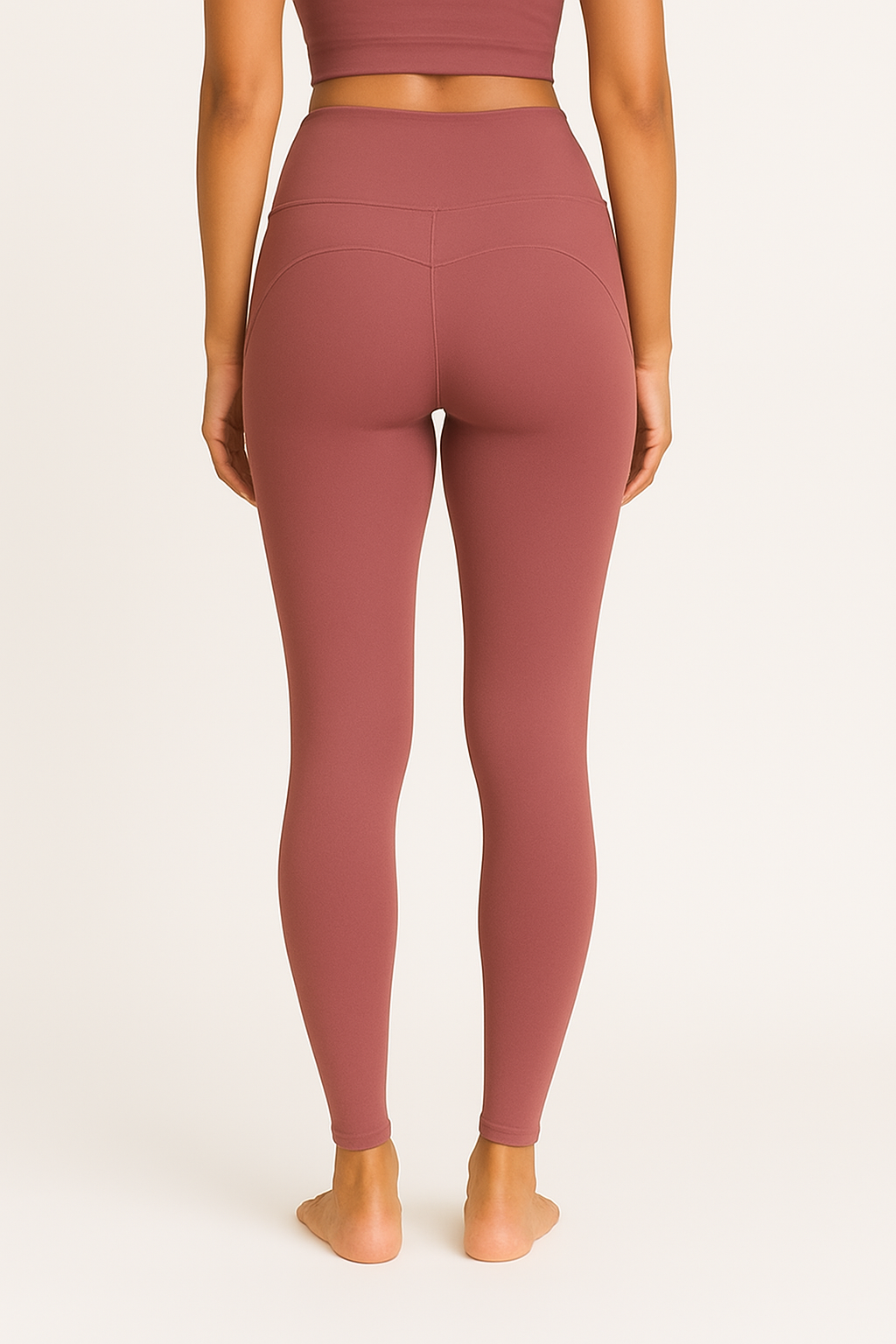 Women's Mauve Leggings – Back View with Model Displaying Rear Sculpt and Smooth Stitch Finish