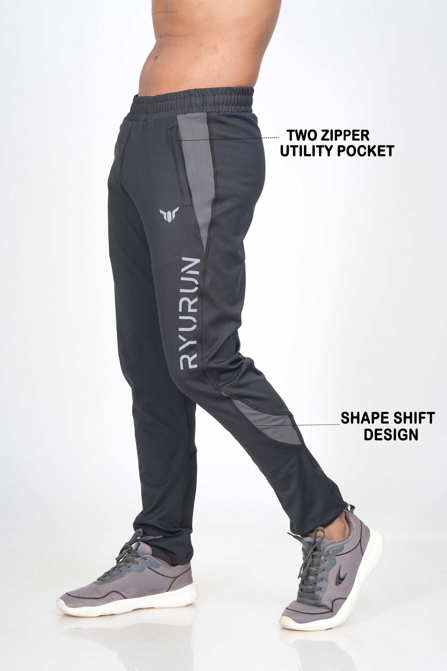 Men's Black Track Pant – Side View Highlighting Pocket and Panel Design  with description.