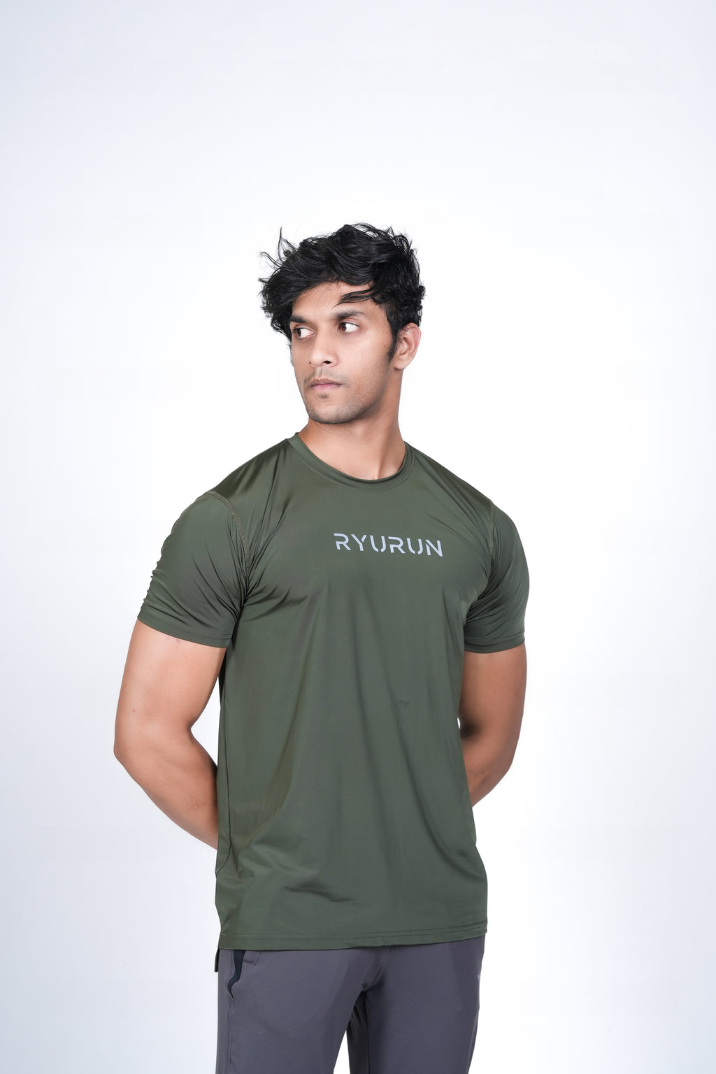 Men's Olive Green T-Shirt – Angled Front Pose Highlighting Side Hem and Shoulder Fit