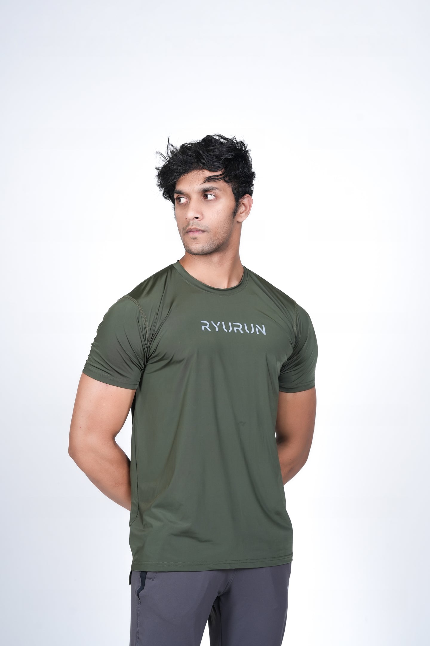 Men's Olive Green T-Shirt – Angled Front Pose Highlighting Side Hem and Shoulder Fit