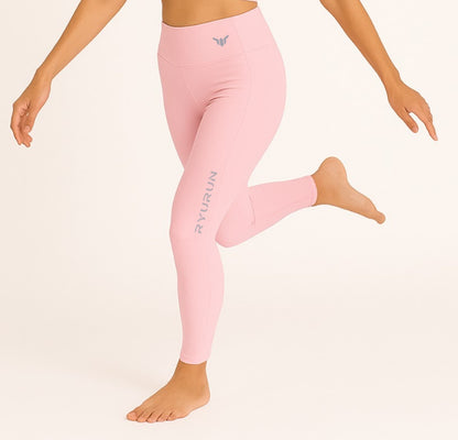 Women's Baby Pink Leggings – Left Side View Displaying Stretch Fabric, Hip Curve, and Ankle Length